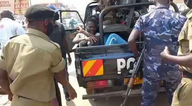 A woman cries for her son arrested for allegedly pelting stones at @KCCAUG enforcement officers in Mpererwe, a Kampala suburb. The same operation left a private security guard also weeping after he was detained for allegedly trying to shoot at KCCA officers @kakumirizi2002
